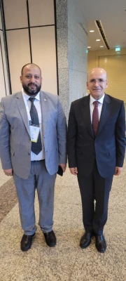 مدير العلاقات العامة بمجموعة امتلاك مع السيد محمد شيمشك وزير الخزانة والمالية التركي